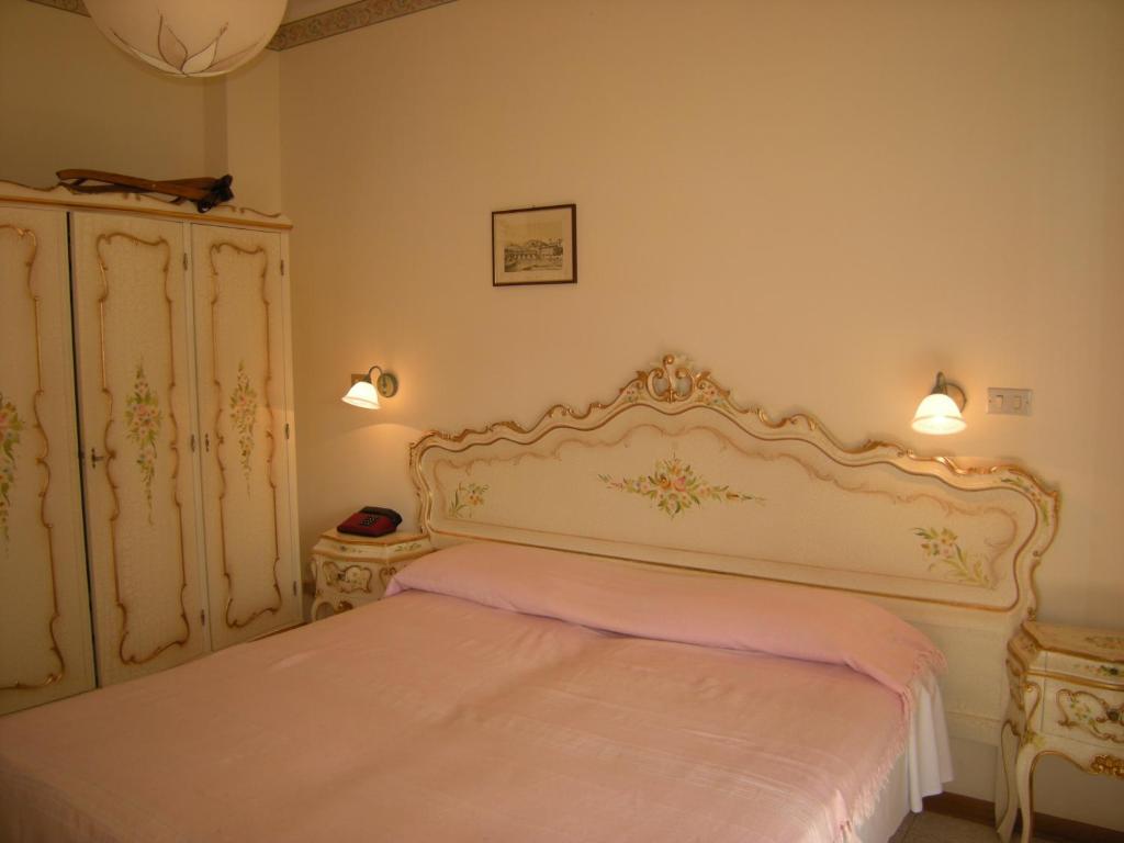 Posteľ alebo postele v izbe v ubytovaní Hotel Continental