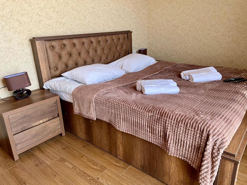 Llit o llits en una habitació de Gudauri Hillsite