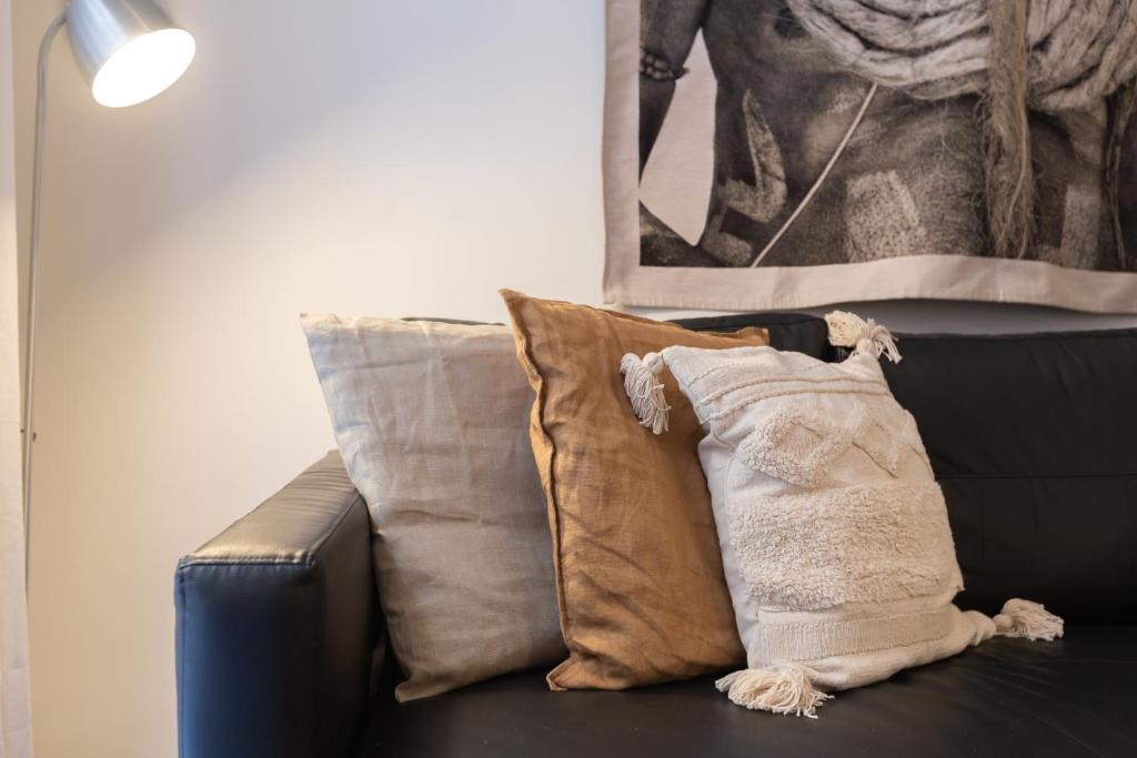 Posedenie v ubytovaní Puerta de Larios: Central three-bedroom apartment with balconies and patio