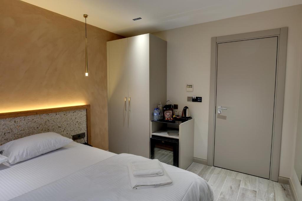 21 Rooms Hotelにあるベッド