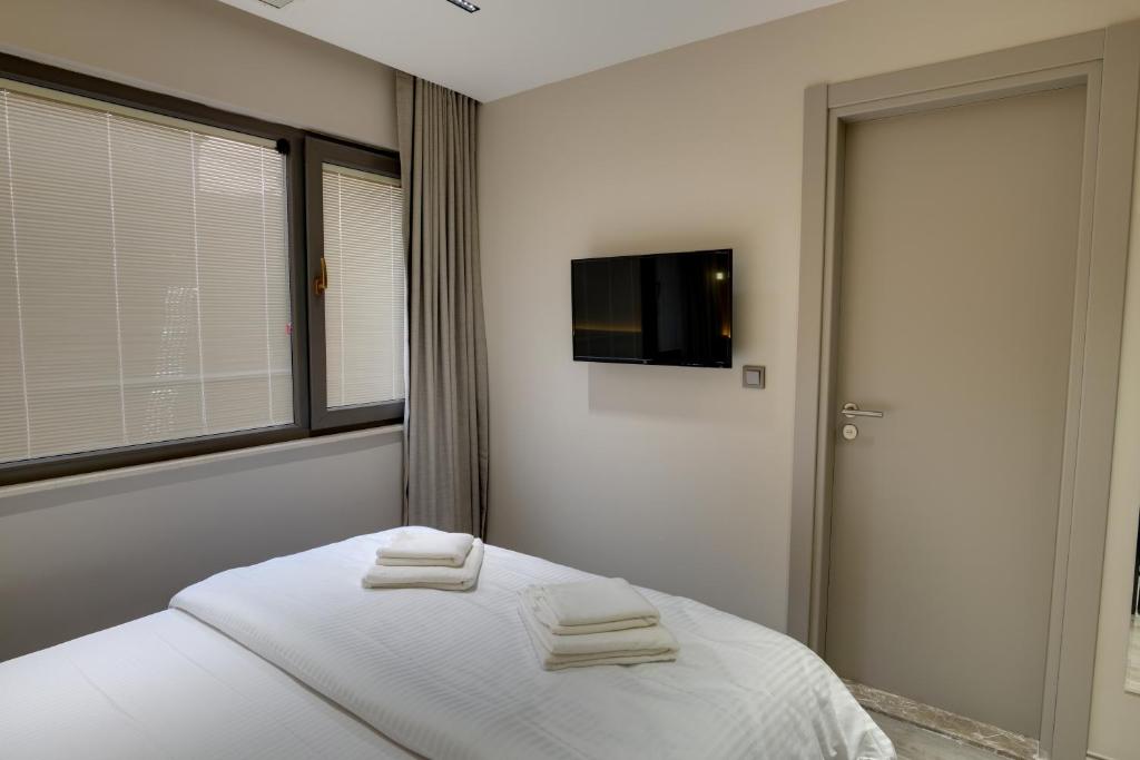 21 Rooms Hotelにあるベッド