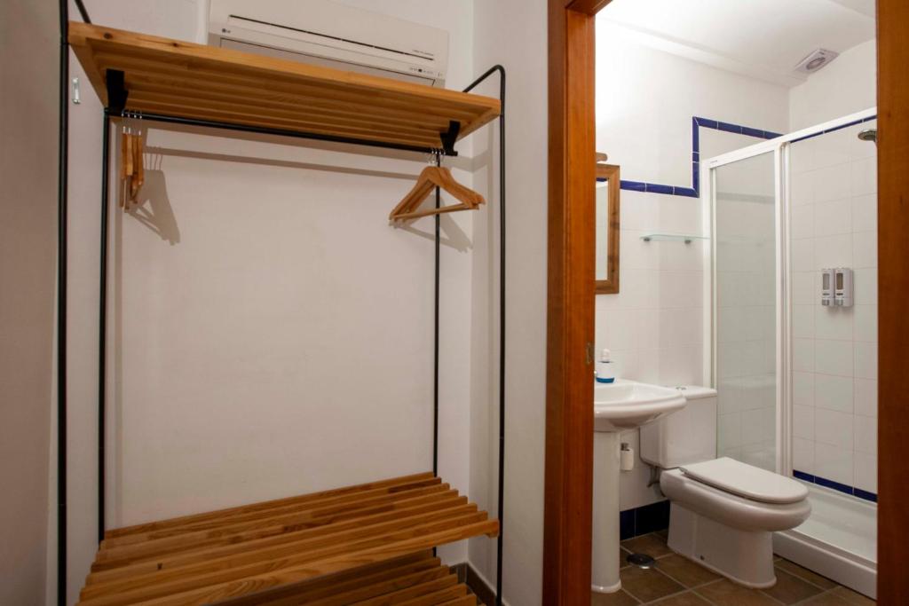Kúpeľňa v ubytovaní Apartamentos Turísticos Lobelia Suites