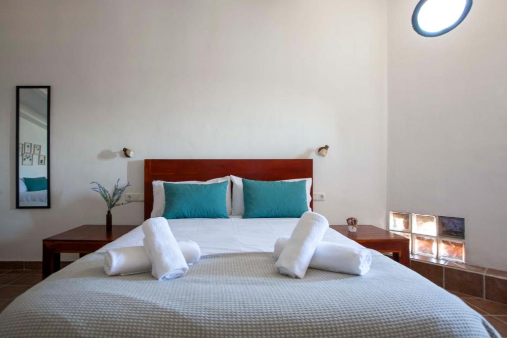 Posteľ alebo postele v izbe v ubytovaní Apartamentos Turísticos Lobelia Suites