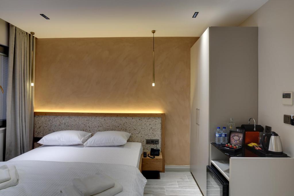 21 Rooms Hotelにあるベッド