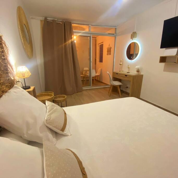 Postel nebo postele na pokoji v ubytování Le Cinderella