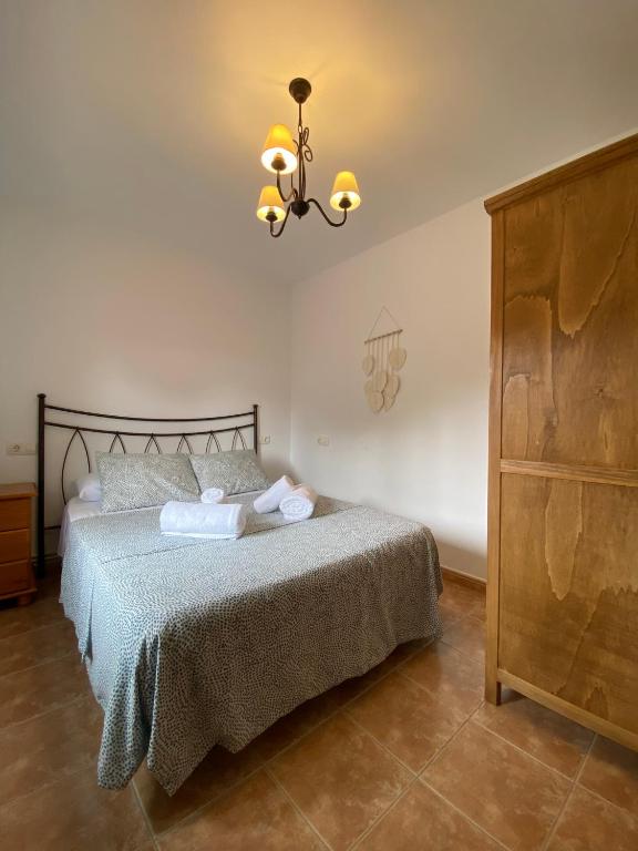 Postel nebo postele na pokoji v ubytování CR La Carrasca