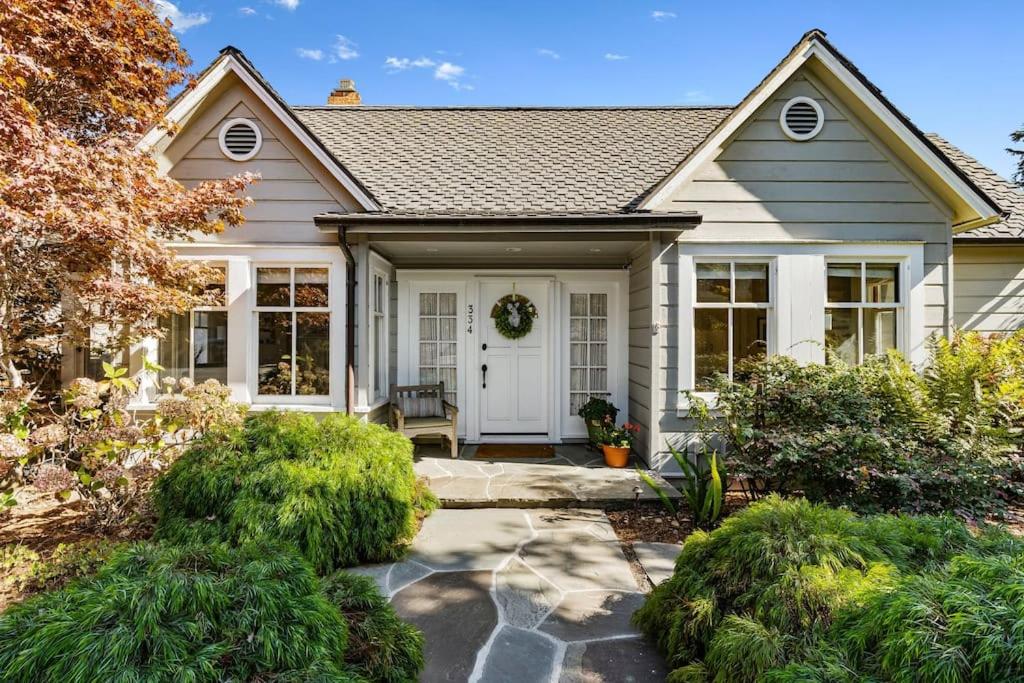 a house with a white door and a porch at Beautiful 5 bedroom home just steps from the beach in Santa Cruz