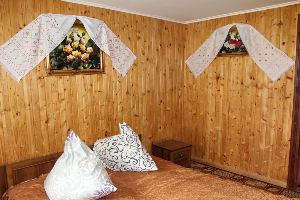 Postel nebo postele na pokoji v ubytování У Василини