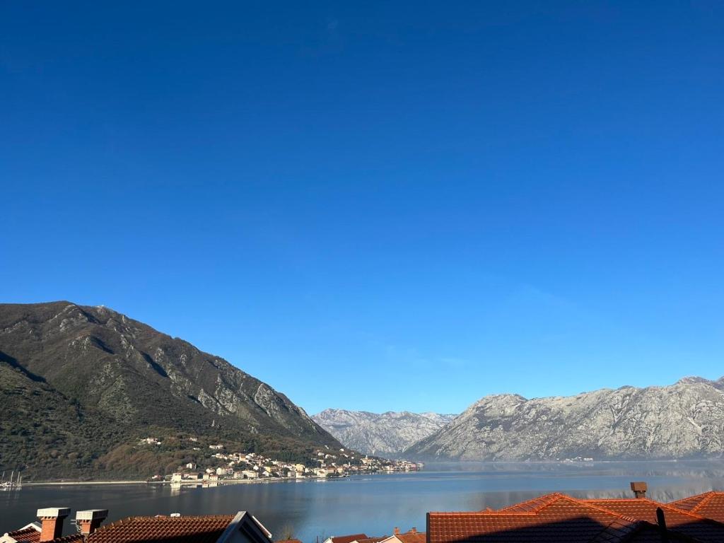 a view of a body of water with mountains at Boka View Luxury Suite - With free Garage Parking in Kotor