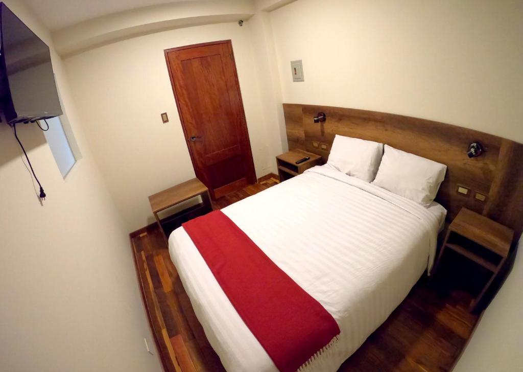 Postel nebo postele na pokoji v ubytování Zans Apartments Cusco