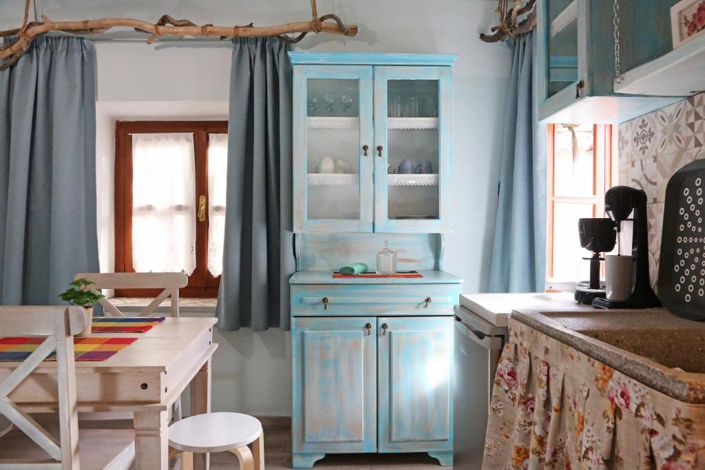 Kuchyň nebo kuchyňský kout v ubytování Kadmilos suites Samothraki