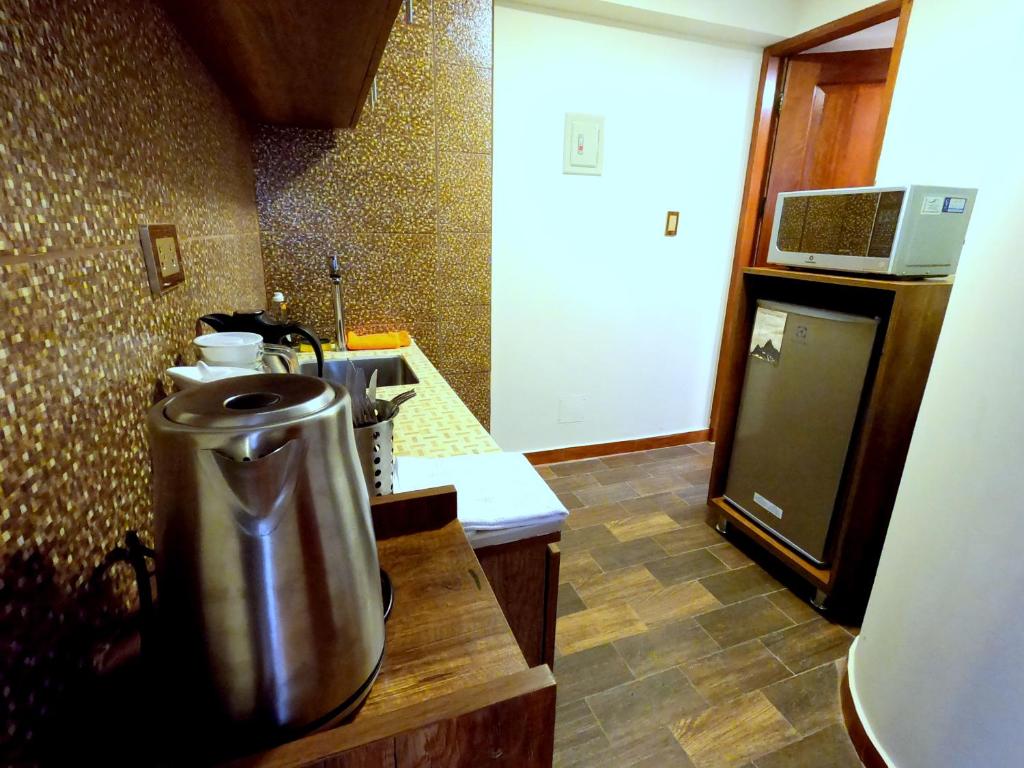 Kuchyň nebo kuchyňský kout v ubytování Zans Apartments Cusco