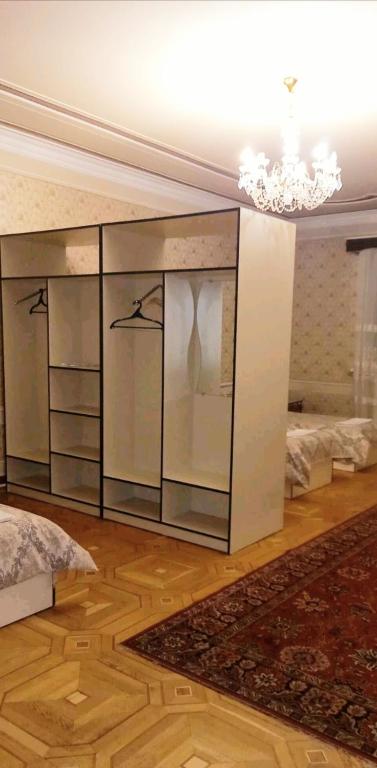 Postel nebo postele na pokoji v ubytování Royal Boutique Hotel on Kievyan
