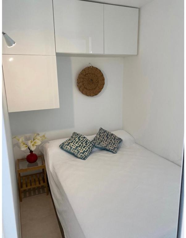 A bed or beds in a room at NEW Atalaya - Amazing Sea Views&Fantastic Pool