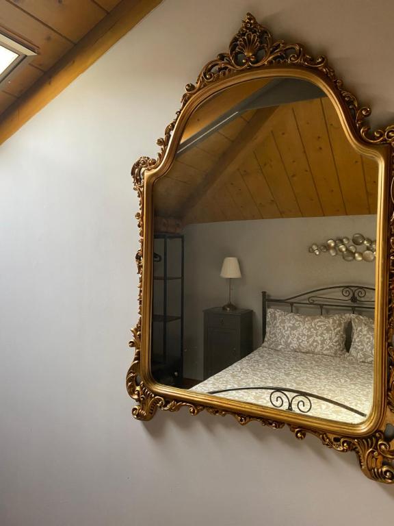 Postel nebo postele na pokoji v ubytování Palazzotto Morelli