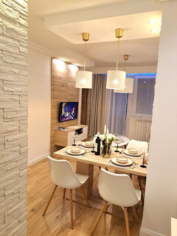 Televízia a/alebo spoločenská miestnosť v ubytovaní Zagreb4you Apartments
