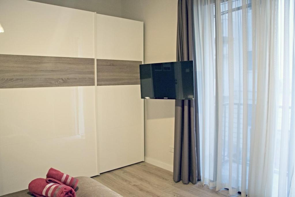 TV a/nebo společenská místnost v ubytování Luxury Msida Circle Suites