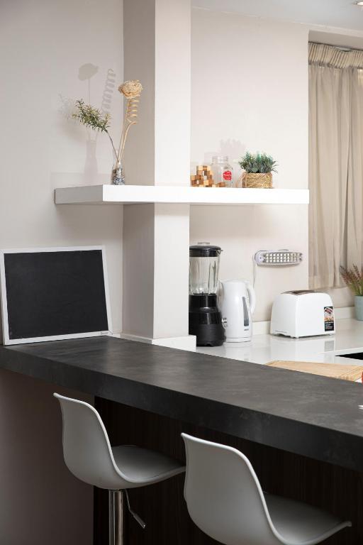 Kuchyň nebo kuchyňský kout v ubytování Luxury Msida Circle Suites