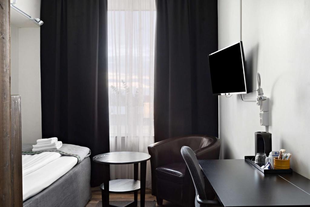 TV a/nebo společenská místnost v ubytování Best Western Hotel Arctic Eden