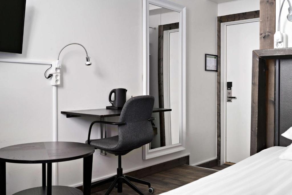 Postel nebo postele na pokoji v ubytování Best Western Hotel Arctic Eden