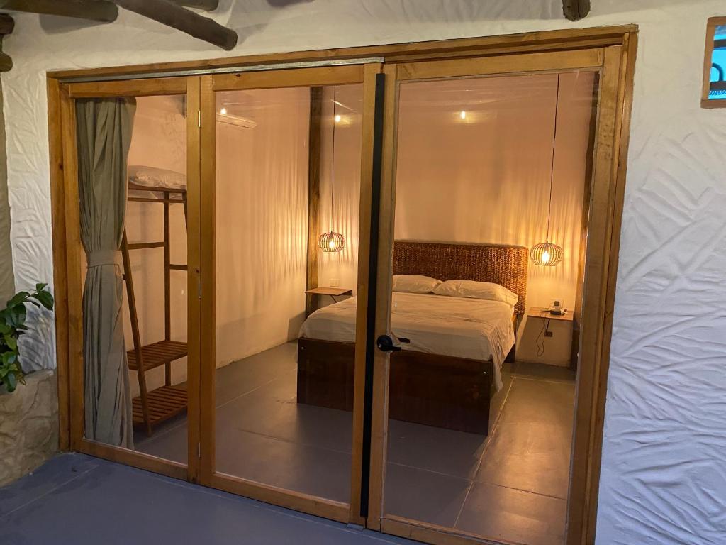 Krevet ili kreveti u jedinici u objektu Hotel Casa Boutique Remolino, Piscina Privada