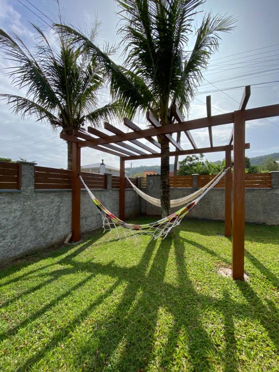 Jardín al aire libre en Casa de Praia Pinheira