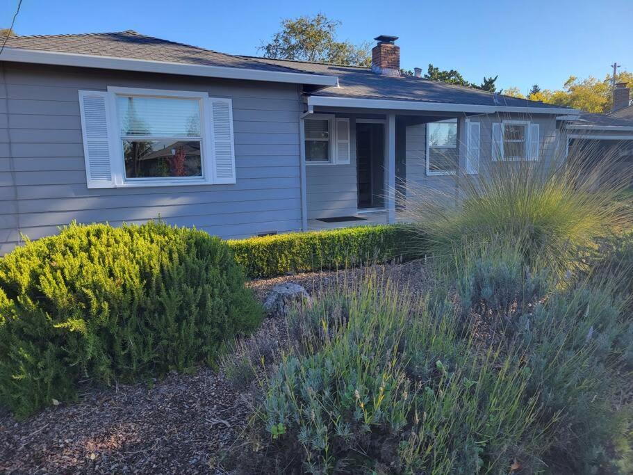 a house with some bushes in front of it at Santa Rosa Gem in Santa Rosa
