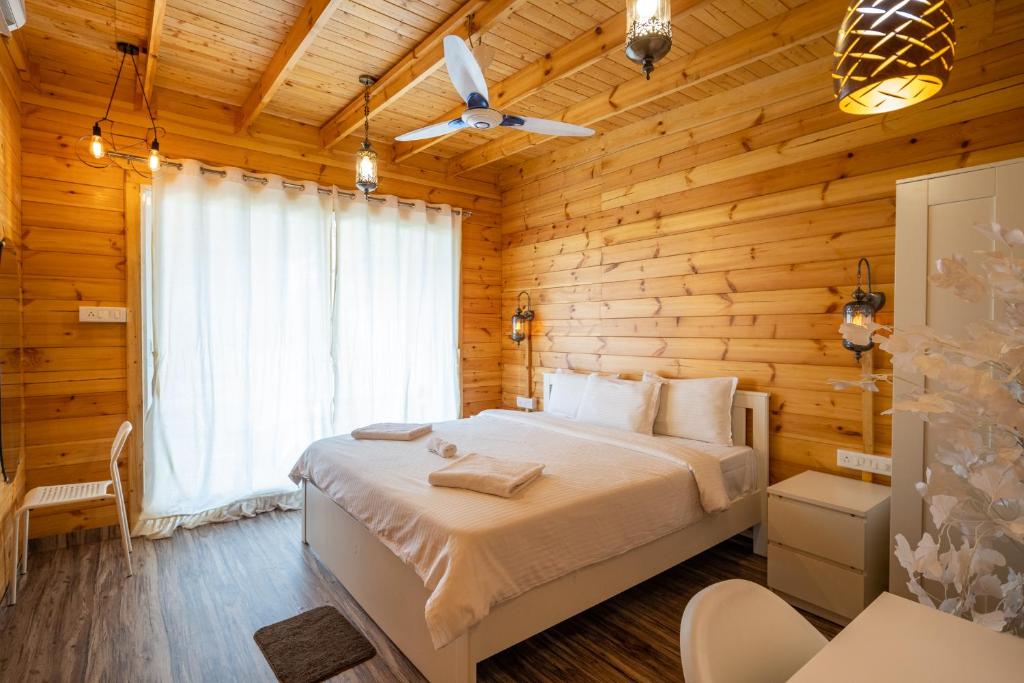 Postel nebo postele na pokoji v ubytování Ourem Palace