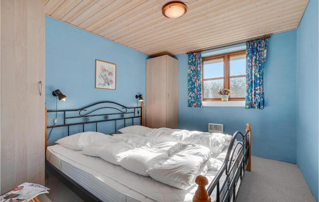 Postel nebo postele na pokoji v ubytování Holiday Home Strandlyst Vinderup Iv