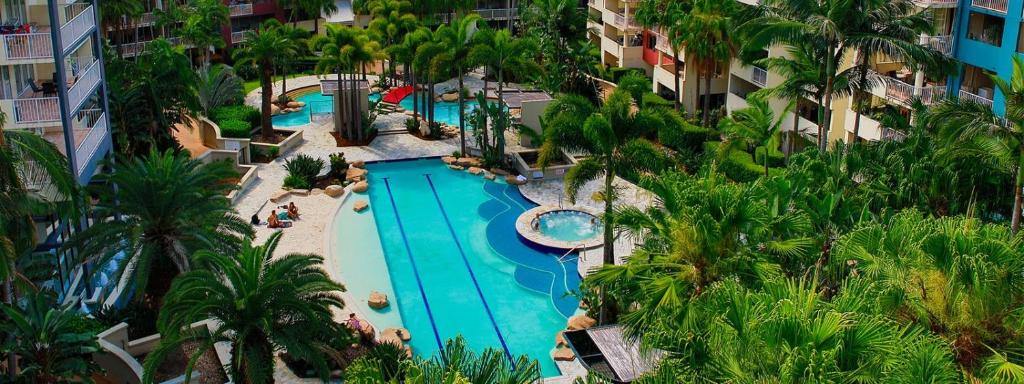 an overhead view of a swimming pool in a resort at City/Valley Resort Apartment in Brisbane