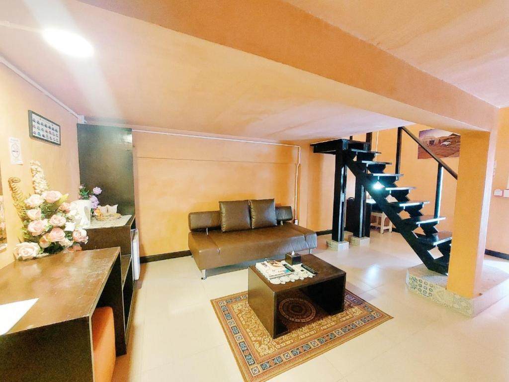 Posezení v ubytování Retro Box Hotel Chumphon