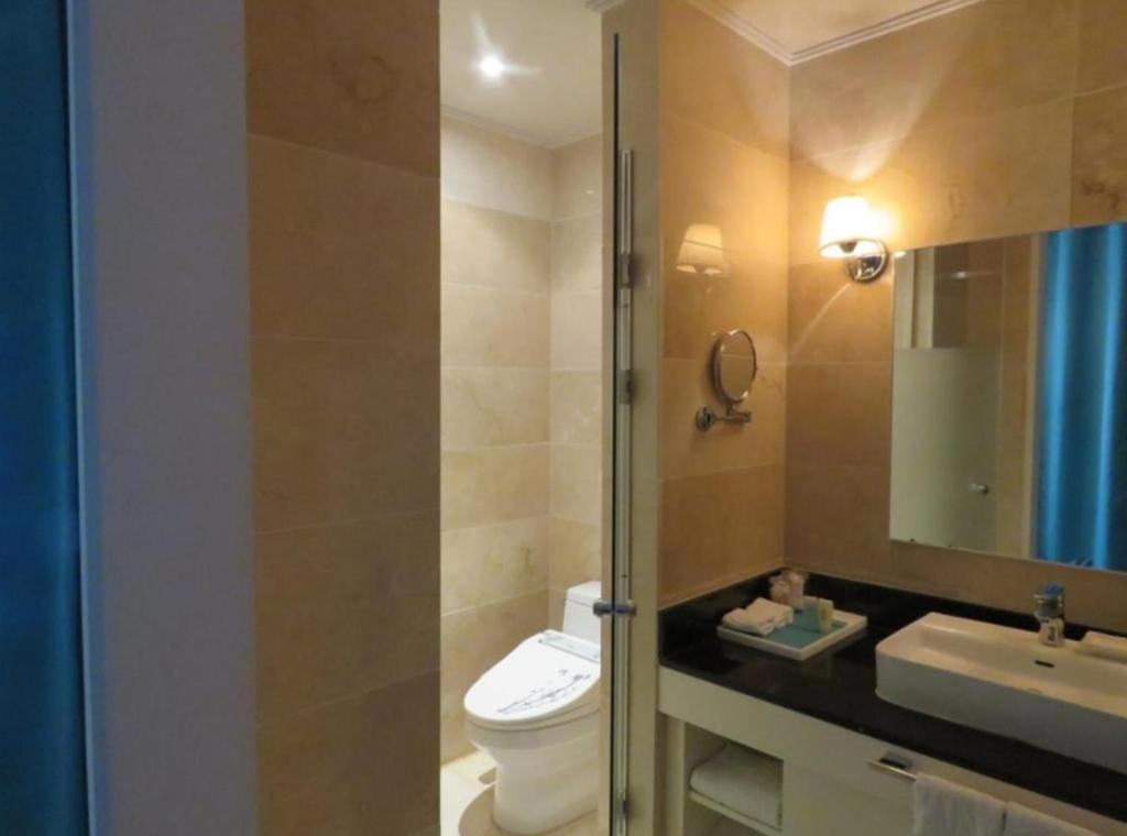 Koupelna v ubytování Ecograd Hotel
