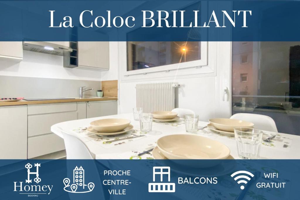 a white kitchen with a table with plates on it at HOMEY LA COLOC BRILLANT - Colocation haut de gamme de 3 chambres uniques et privées / Proche centre-ville et transports en commun / Balcons / Wifi gratuit in Annemasse