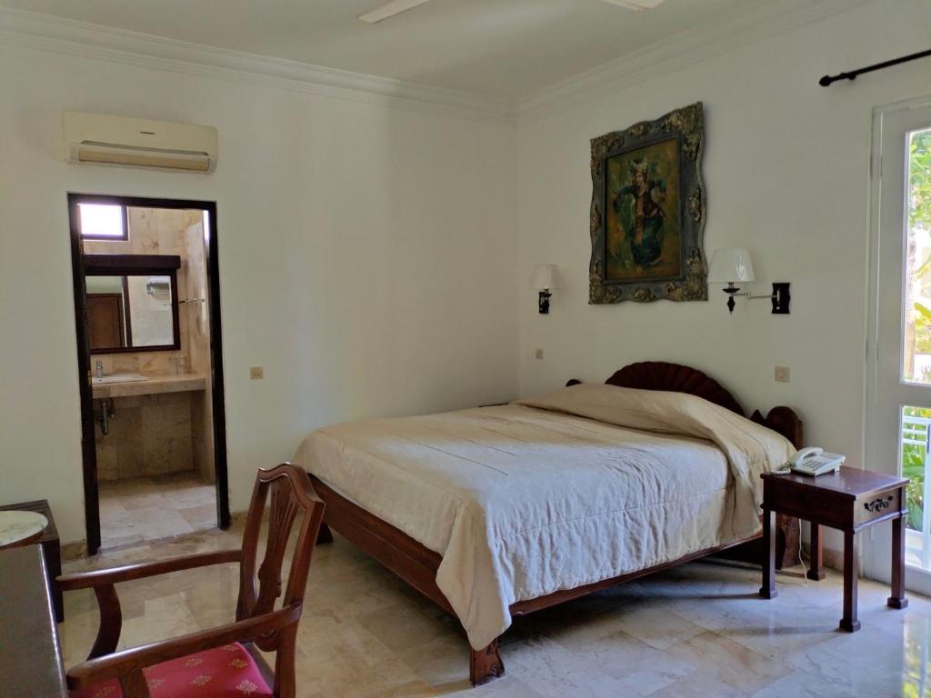 Postel nebo postele na pokoji v ubytování Grand Kumala Hotel - Hotel Kumala Legian Kuta Bali