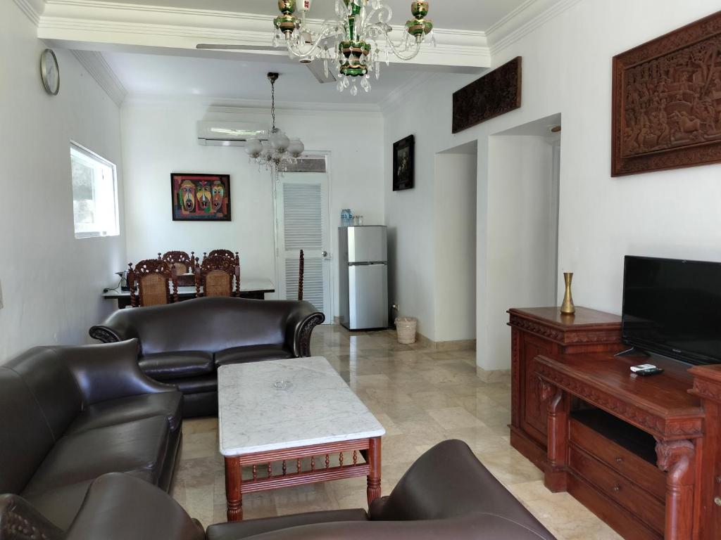 TV a/nebo společenská místnost v ubytování Grand Kumala Hotel - Hotel Kumala Legian Kuta Bali