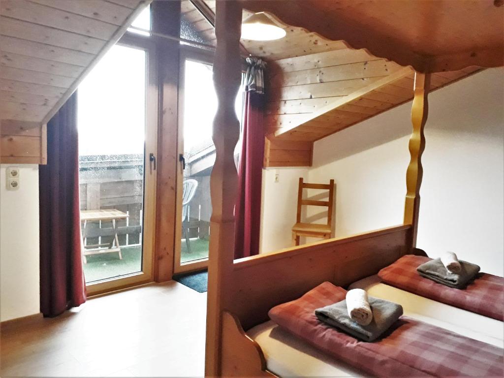Postel nebo postele na pokoji v ubytování Romantik Appartements