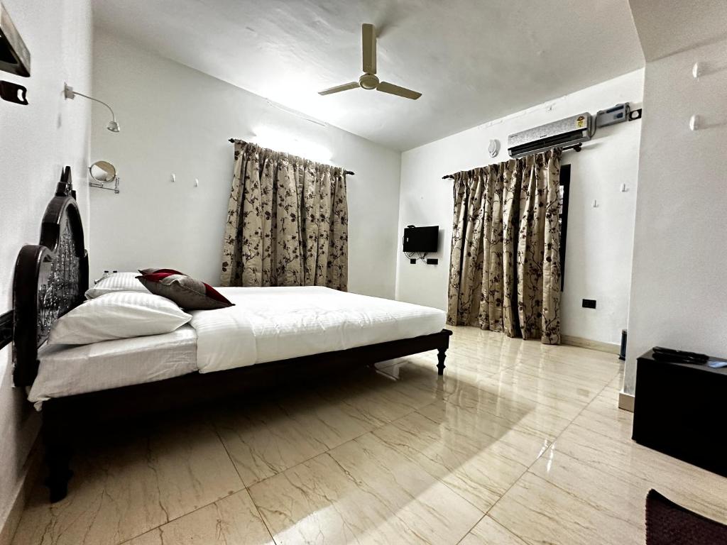 Kovalam Beach House - Deluxe Tweepersoonskamer (2 Volwassenen + 1 Kind)