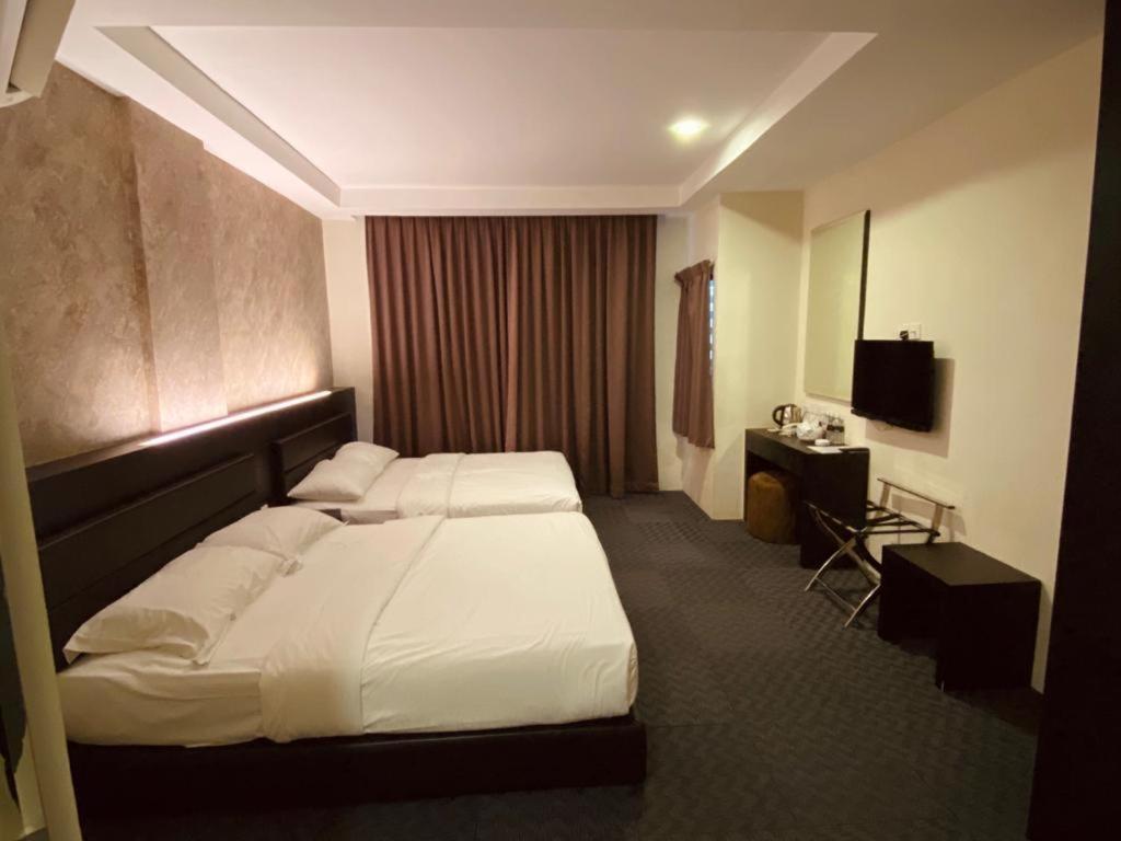 TV a/nebo společenská místnost v ubytování Just Hotel BP