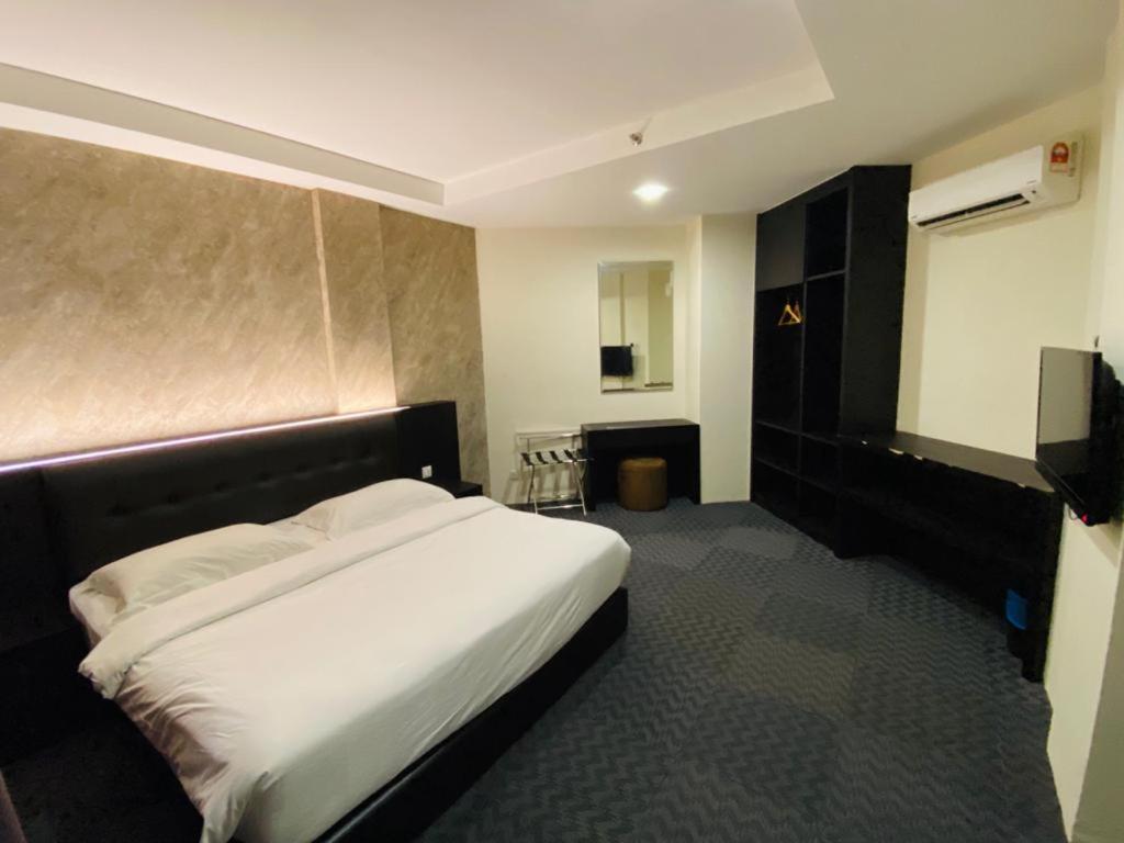 Postel nebo postele na pokoji v ubytování Just Hotel BP