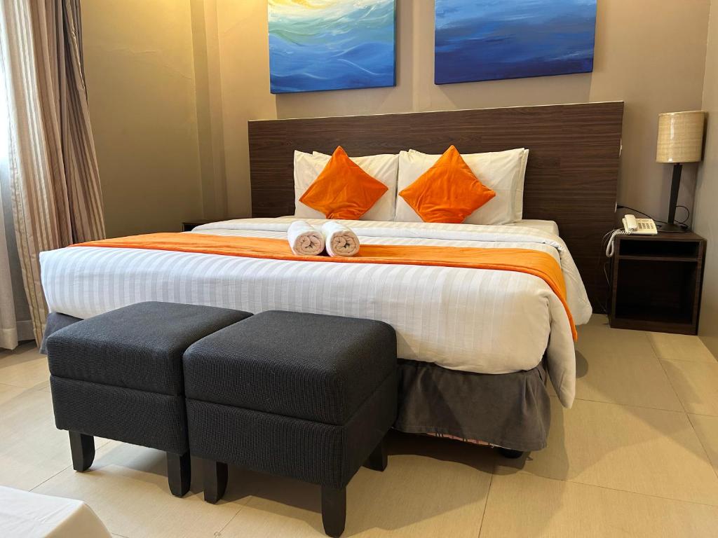 HOLIDAY SUITES HOTEL AND RESORT PROMO DUAL B: PPS-ELNIDO WITH AIRFARE puerto-princesa Packages
