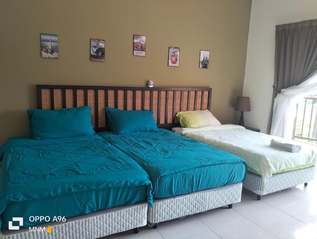 Postel nebo postele na pokoji v ubytování Izz room studio Gold Coast Morib Resort
