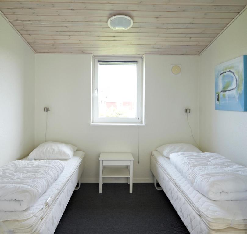 Postel nebo postele na pokoji v ubytování Lalandia Billund