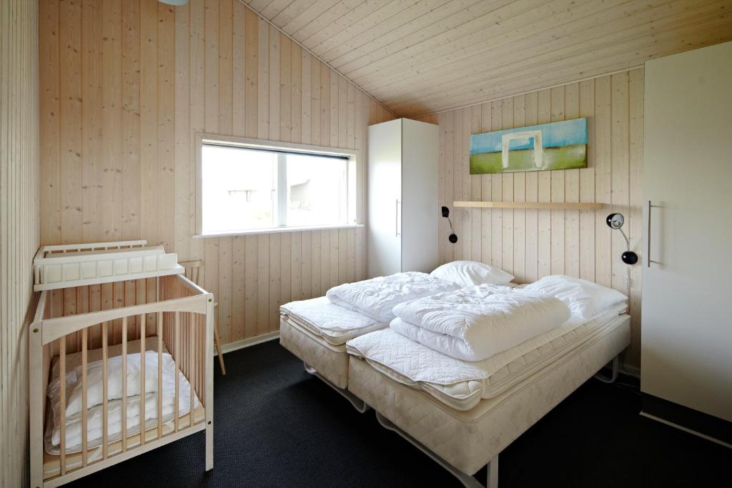 Postel nebo postele na pokoji v ubytování Lalandia Billund