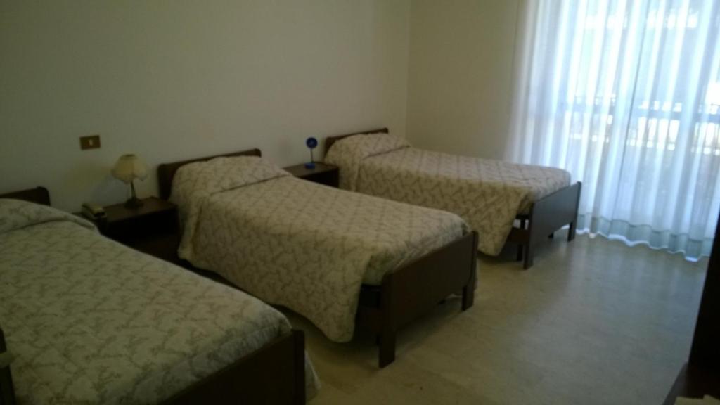 Postel nebo postele na pokoji v ubytování Hotel Panama