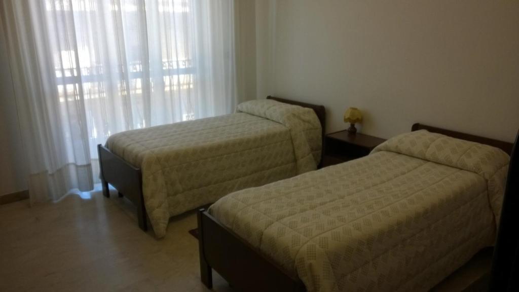 Postel nebo postele na pokoji v ubytování Hotel Panama