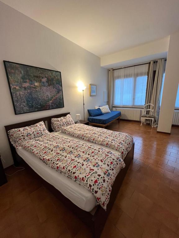 Postel nebo postele na pokoji v ubytování accogliente camera con bagno privato