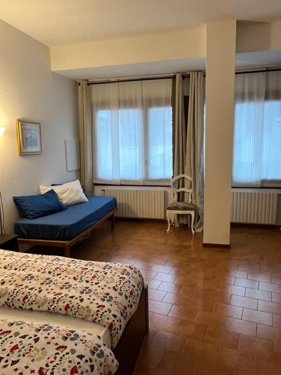 Postel nebo postele na pokoji v ubytování accogliente camera con bagno privato