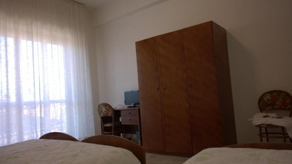 Postel nebo postele na pokoji v ubytování Hotel Panama