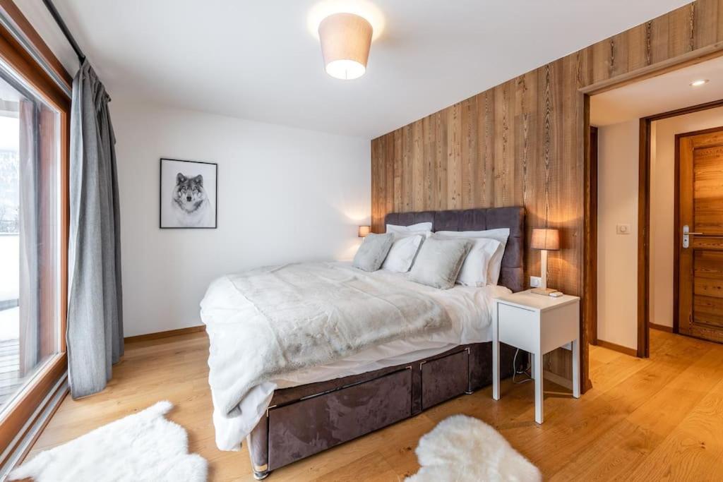 Łóżko lub łóżka w pokoju w obiekcie Appartement Abela 10 Pers Domaine de Serre Chevalier