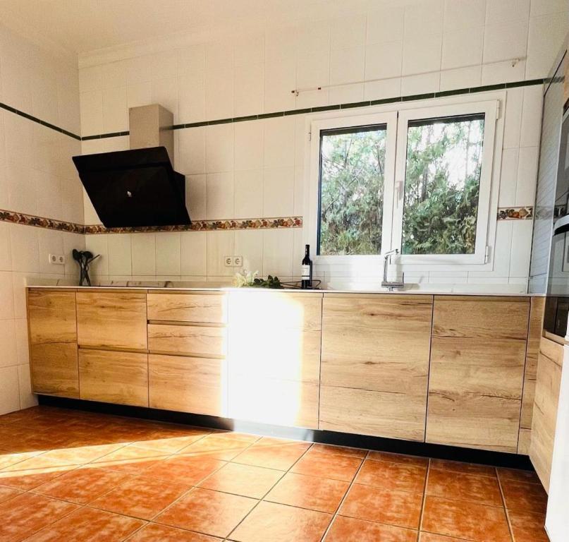 Kuchyň nebo kuchyňský kout v ubytování Villa Paula